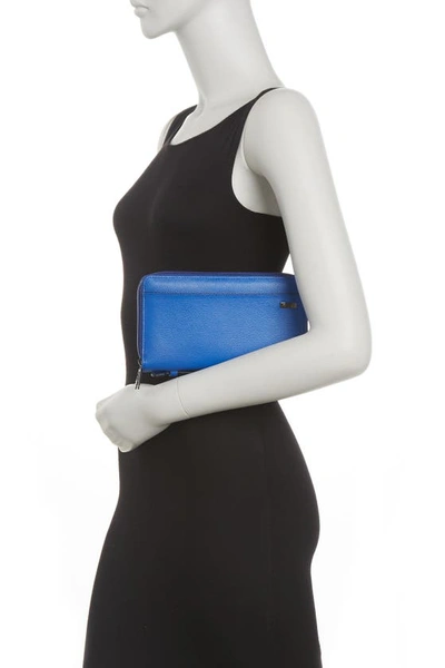 Shop Tumi Leather Double Zip Cardholder Clutch In Cobalt Embossed