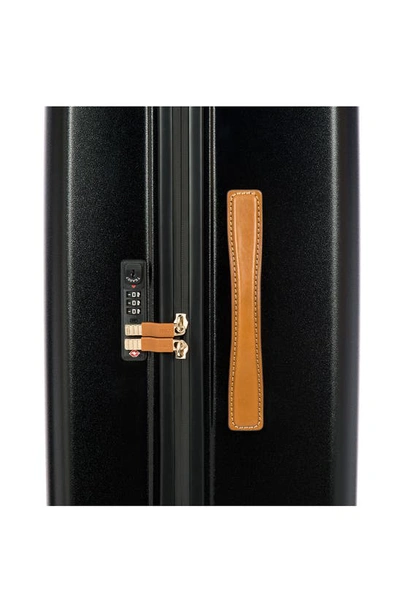 Shop Bric's Amalfi 27" Spinner Suitcase In Black/ Tan