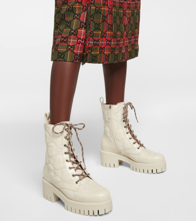 Shop Gucci Gg Quilted Leather Lace-up Boots In Milk White/m.whi/m.w