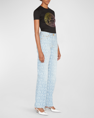 Shop Versace Logo-print Straight-leg Denim Pants In Light Blue