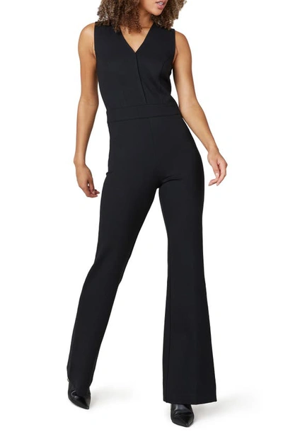 Shop Spanx Sleeveless Flare Ponte Jumpsuit In Classic Black