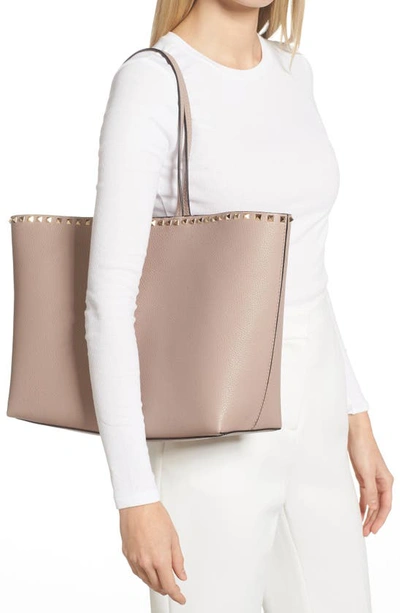 Shop Valentino Rockstud Leather Tote In Poudre Pink