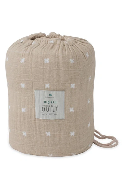 Shop Little Unicorn Kids' Cotton Muslin Quilted Throw In Taupe Cross