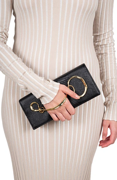 ALEXIS BITTAR ALEXIS BITTAR TWISTED SIDE HANDLE LEATHER CLUTCH 