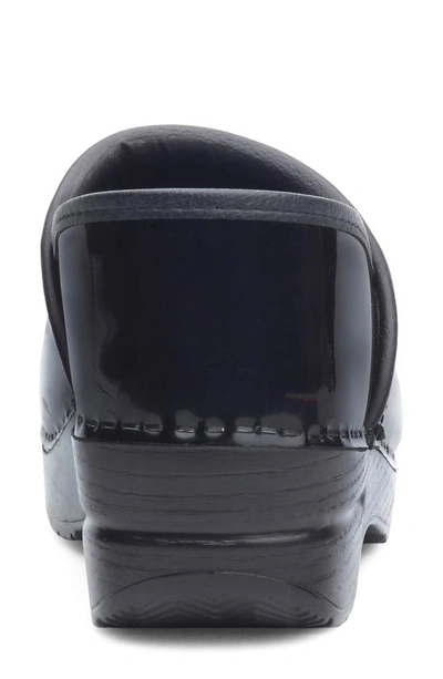 Dansko Professional Womens Solid Patent Leather Clogs In Black