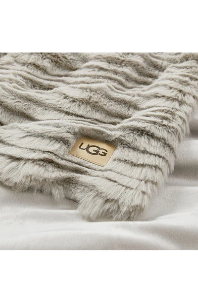 Shop Ugg Cayden Faux Fur Throw Blanket In Clamshell