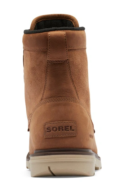 Shop Sorel Carson Storm Waterproof Boot In Camel Brown/ Oatmeal