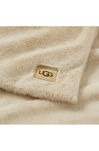 Shop Ugg Marcella Faux Fur Throw Blanket In Lt Sand