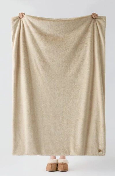 Shop Ugg Marcella Faux Fur Throw Blanket In Lt Sand