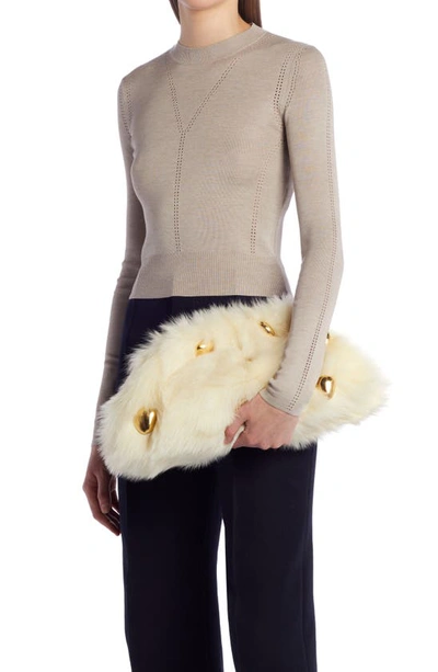 Bottega Veneta The Pouch Stud Embellished Genuine Shearling Clutch In Camomile-m Brass