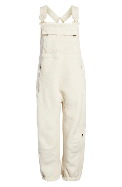 Shop Free People Fp Movement Hit The Slopes High Pile Fleece Snow Bibs In Muted Beige