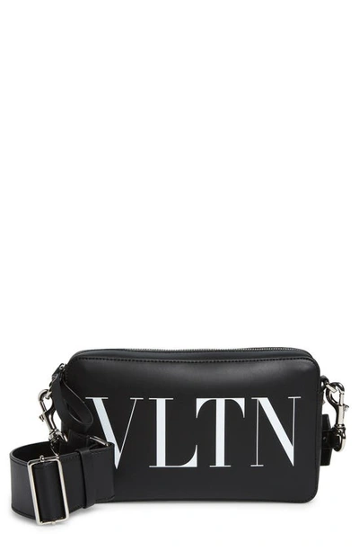 Shop Valentino Vltn Logo Leather Crossbody Bag In Nero/ Bianco