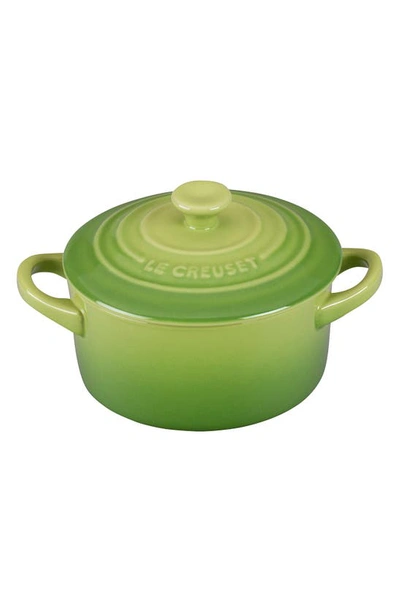 Shop Le Creuset Mini Round Cocotte In Palm