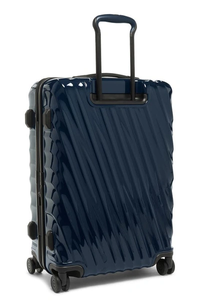 Shop Tumi 22-inch 19-degree International Expandable 4-wheel Carry-on In Navy