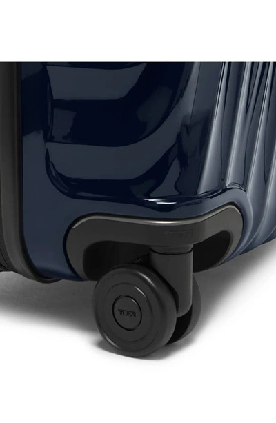 Shop Tumi 22-inch 19-degree International Expandable 4-wheel Carry-on In Navy