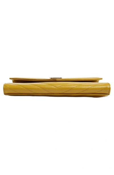 Shop Saint Laurent Monogram Quilted Leather Clutch In Chartreuse
