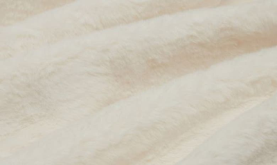 Shop Apparis Brady Faux Fur Throw Blanket In Ivory