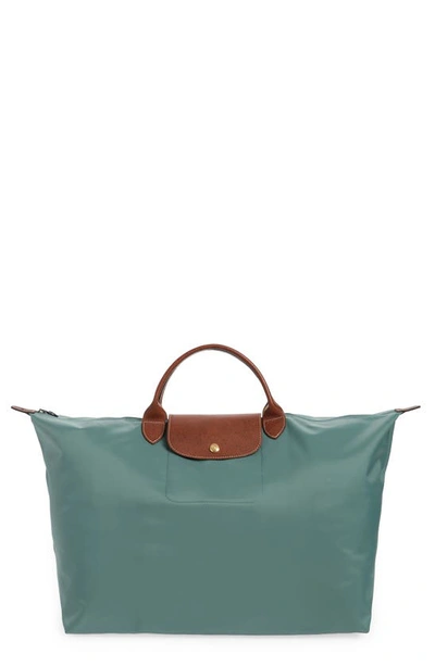 Shop Longchamp Large Le Pliage Travel Bag In Cypress