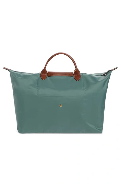 Shop Longchamp Large Le Pliage Travel Bag In Cypress