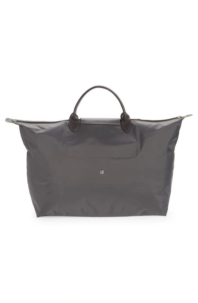 Shop Longchamp Large Le Pliage Travel Bag In Graphite