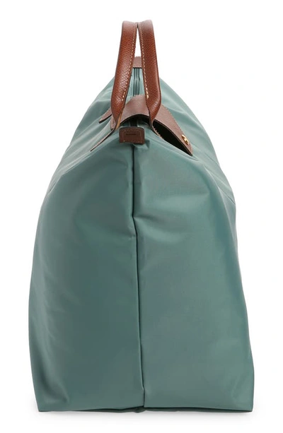 Shop Longchamp Large Le Pliage Travel Bag In Cypress