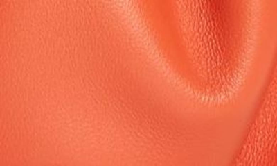 Shop Staud Bean Leather Clutch In Blood Orange