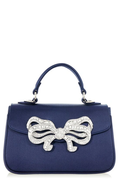 Shop Judith Leiber Satin Bow Top Handle Bag In Silver Navy