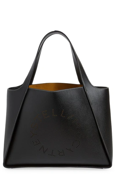 Shop Stella Mccartney Perforated Logo Faux Leather Tote In 1000 - Black