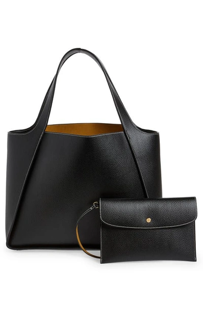 Shop Stella Mccartney Perforated Logo Faux Leather Tote In 1000 - Black