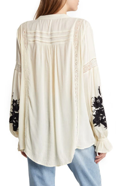 Shop Free People Tusalossa Embroidered Lace Trim Split Neck Top In Ivory Combo