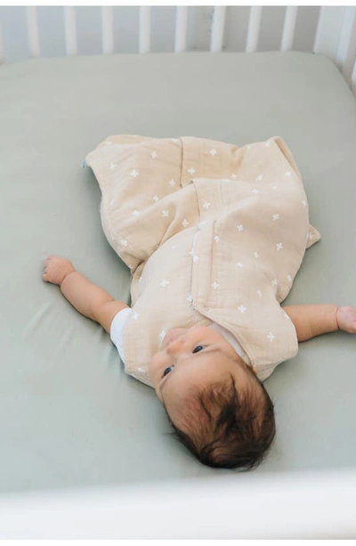 Shop Little Unicorn Cotton Muslin Wearable Blanket In Taupe Cross