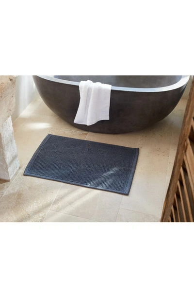 Shop Coyuchi Pebbled Organic Cotton Bath Mat In French Blue