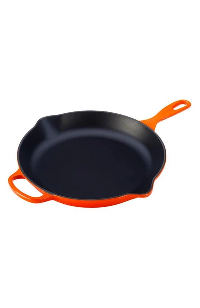 Shop Le Creuset Signature Handle Enamel 11 3/4 Inch Cast Iron Skillet In Flame