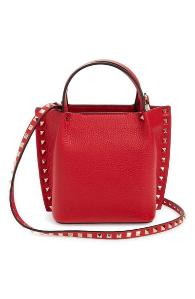 Shop Valentino Small Rockstud Leather Tote In Rouge Pur