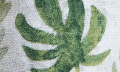 Shop Little Unicorn Cotton Muslin Swaddle Blanket In Tropical Leaf