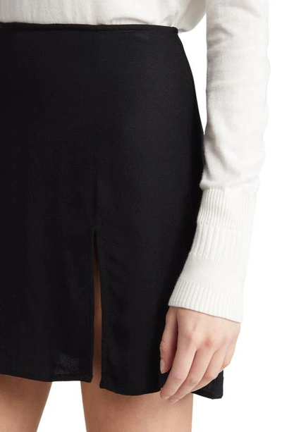 Shop Reformation Margot Miniskirt In Black