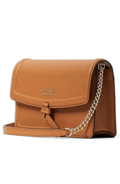 Shop Kate Spade Knott Pebbled Leather Flap Crossbody Bag In Bungalow