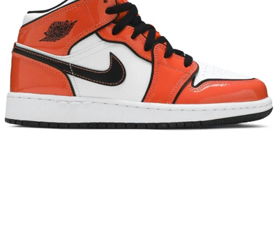 Shop Nike Kids Unisex Air Jordan 1 Mid Se Sneaker In Turf Orange/black/white In Multi