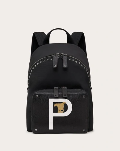 Shop Valentino Garavani Garavani Rockstud Pet Customizable Backpack In ブラック/ホワイト