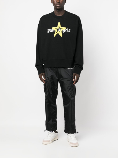 Shop Palm Angels Star Sprayed-print Sweatshirt In Black