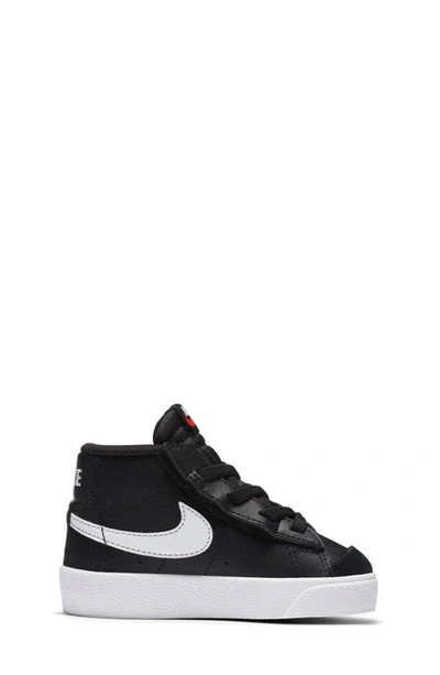 Shop Nike Kids' Blazer Mid '77 Sneaker In Black/ White/ White/ Orange