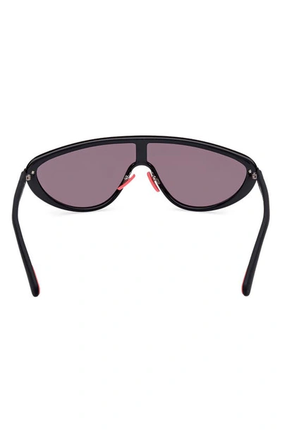 Shop Moncler Vitesse Shield Sunglasses In Shiny Black/ Smoke