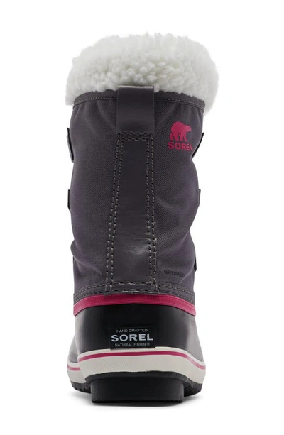Shop Sorel Kids' Yoot Pac Waterproof Snow Boot In Pulse/ Black