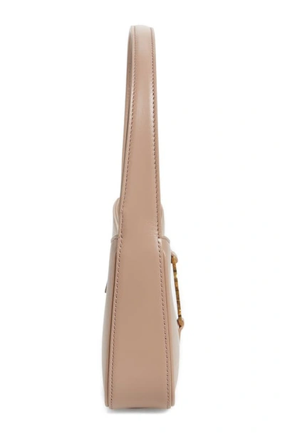 Shop Saint Laurent LE 5 À 7 MINI HOBO BAG IN VEGETABLE-TANNED LEATHER  (710318) by Eliza08