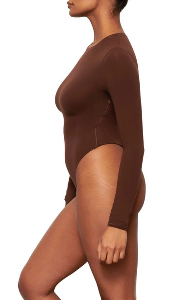 Shop Skims Fits Everybody Long Sleeve Crewneck Bodysuit In Cocoa