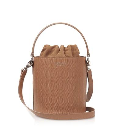 Shop Meli Melo Santina Light Tan Woven Bucket Bag For Women