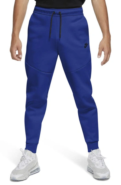 Shop Nike Tech Fleece Jogger Sweatpants In Game Royal/ Black