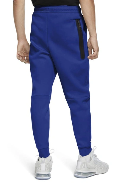 Shop Nike Tech Fleece Jogger Sweatpants In Game Royal/ Black