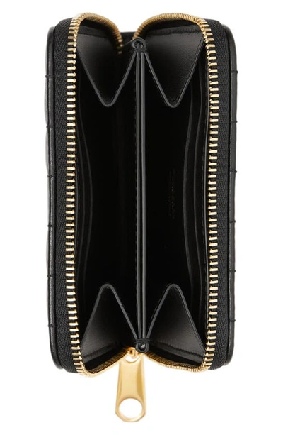 Shop Burberry Mini Lola Quilted Lambskin Zip Around Wallet In Black / Light Gold