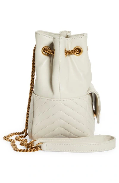 Shop Saint Laurent Mini Joy Matelassé Leather Bucket Bag In Crema Soft